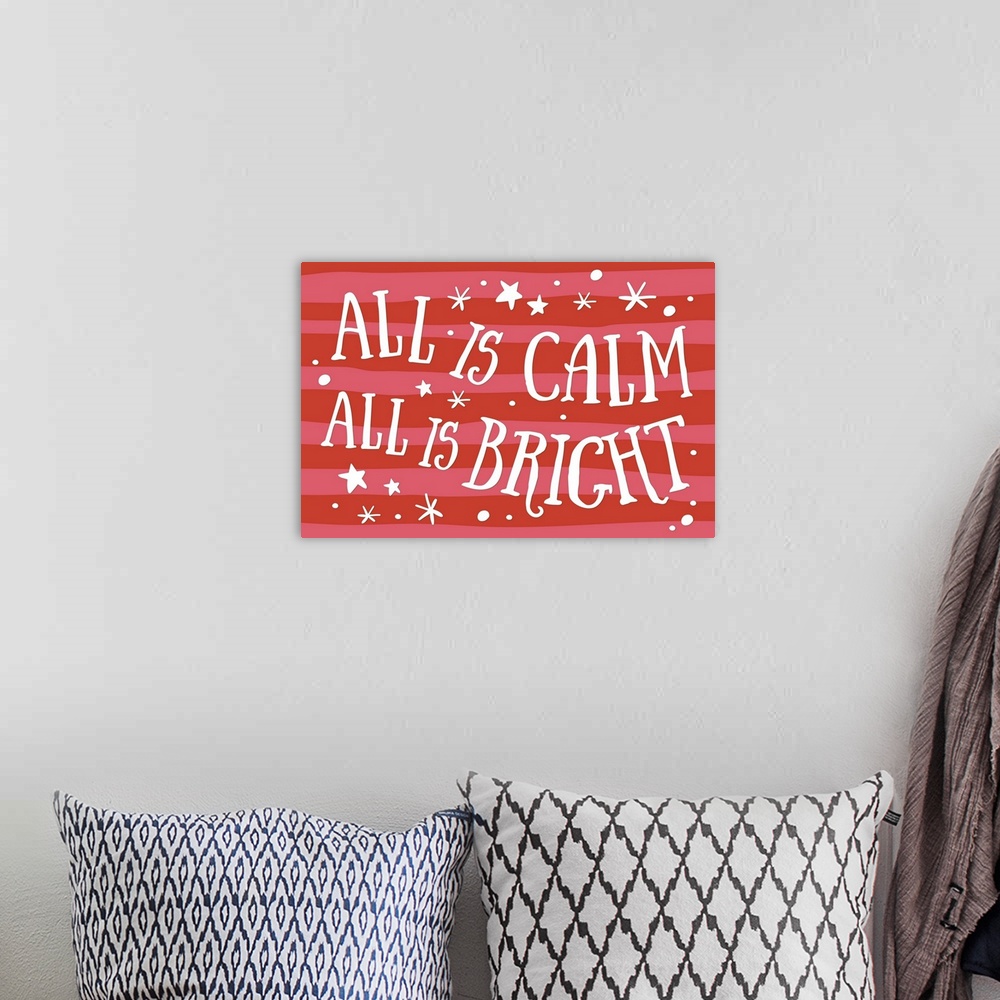 A bohemian room featuring Textual holiday art surrounded by varying star graphics on a warm, horizontally striped background.
