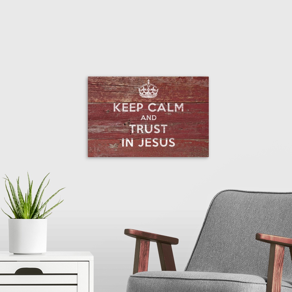 A modern room featuring "Keep Calm And Trust In Jesus" with a crown in white on a wood backdrop.