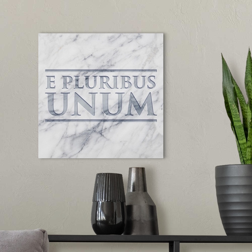 A modern room featuring E PLURIBUS UNUM etched in marble.