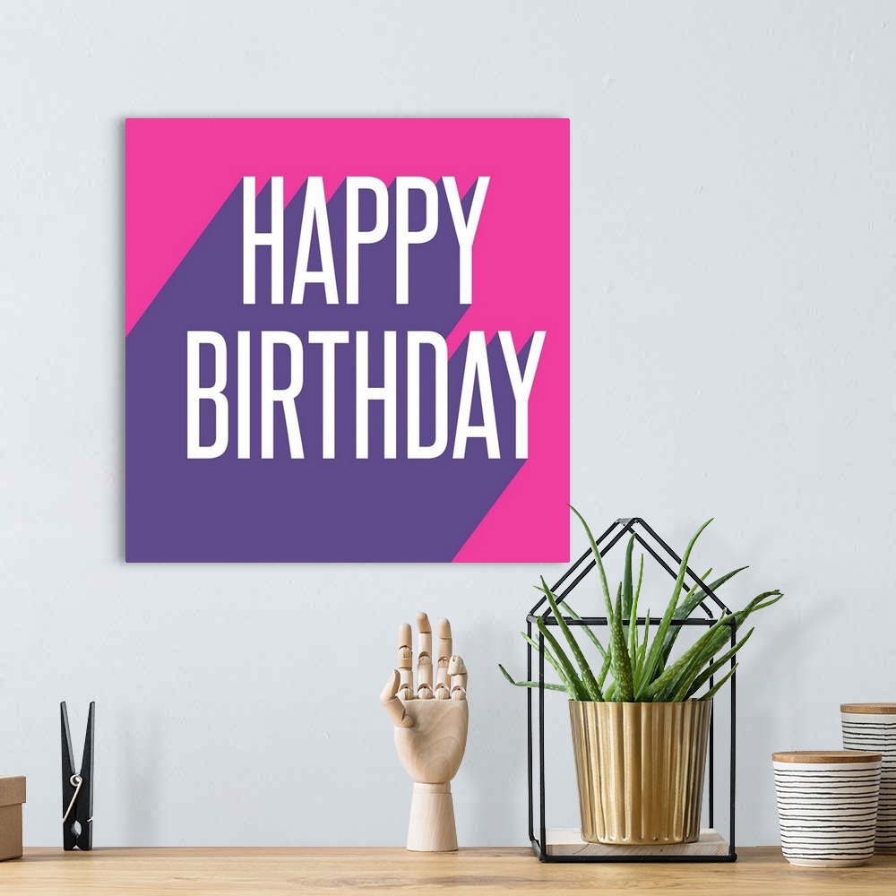 A bohemian room featuring Graphic pop art style text that reads "Happy Birthday"