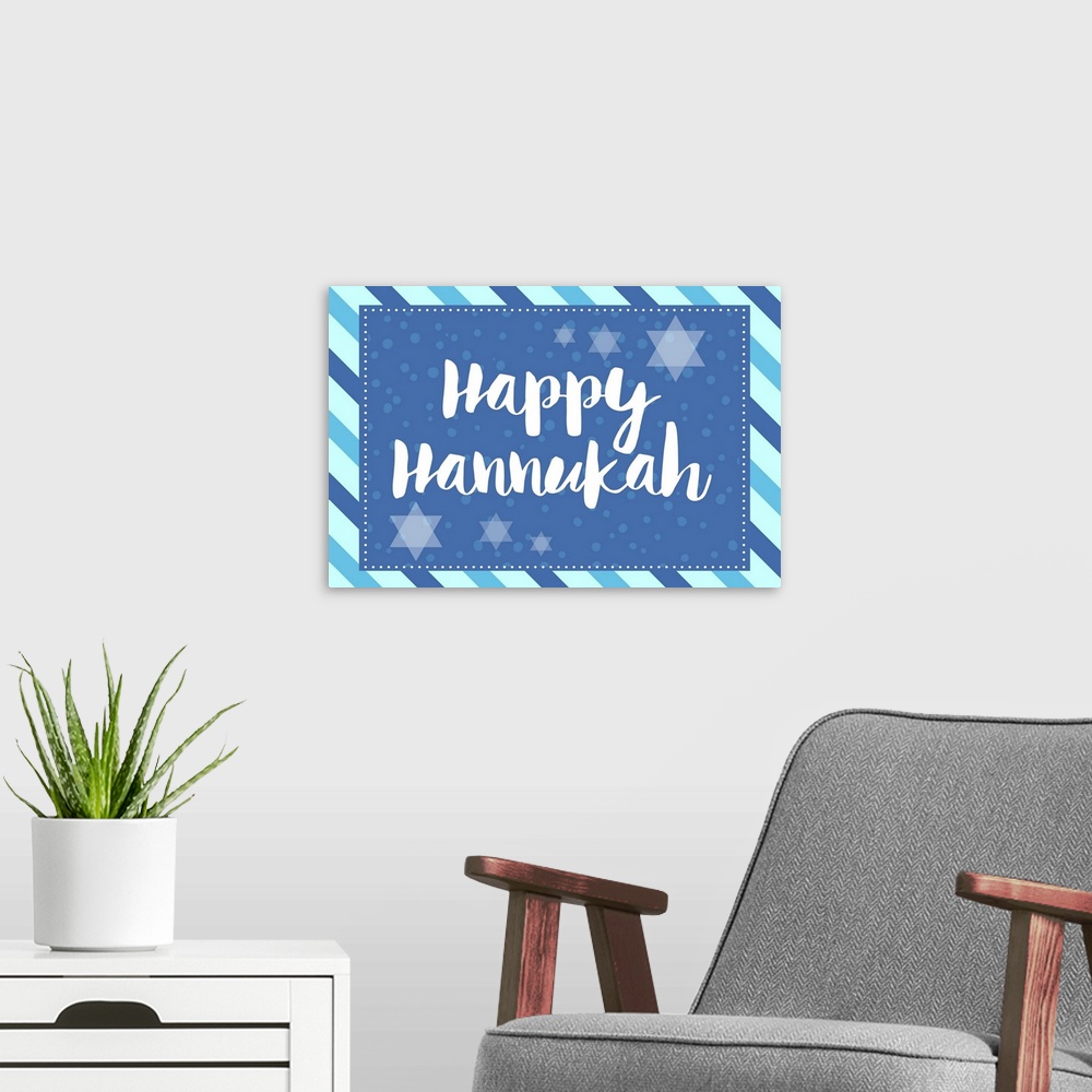A modern room featuring Graphic holiday art in cool tones with large text surrounded by Star of David graphics and a diag...