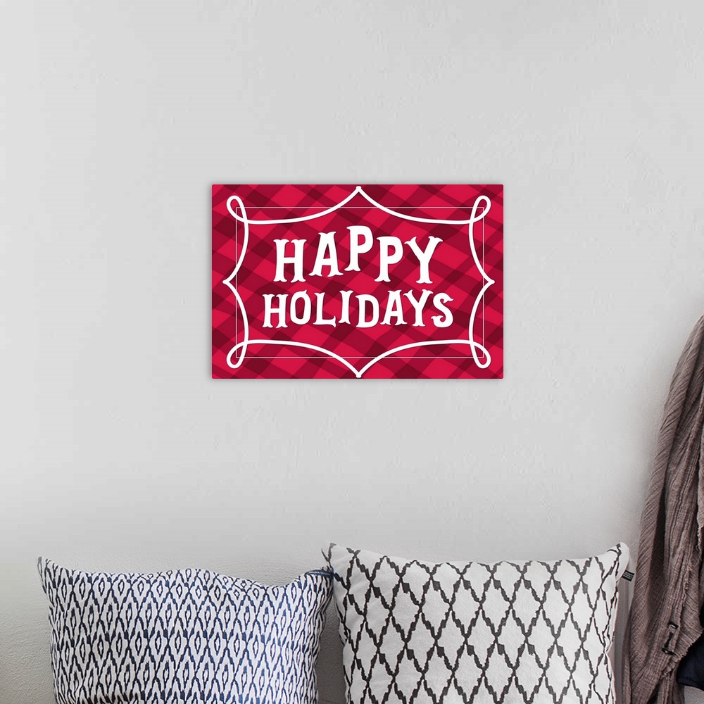 A bohemian room featuring Graphic holiday art with large text surrounded by a decorative border on a warm plaid background.