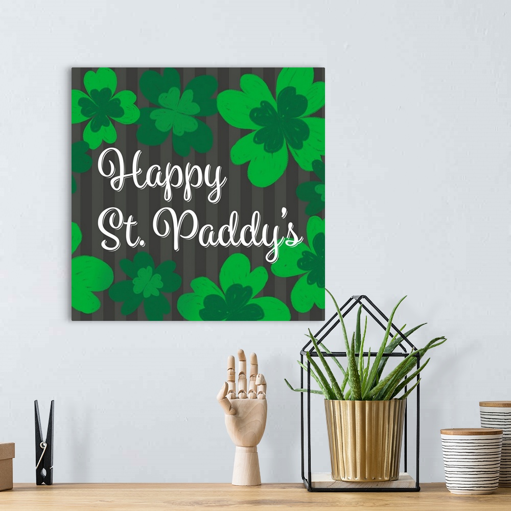 A bohemian room featuring "Happy St. Paddy's" written in white on a black and gray striped background with green clovers al...
