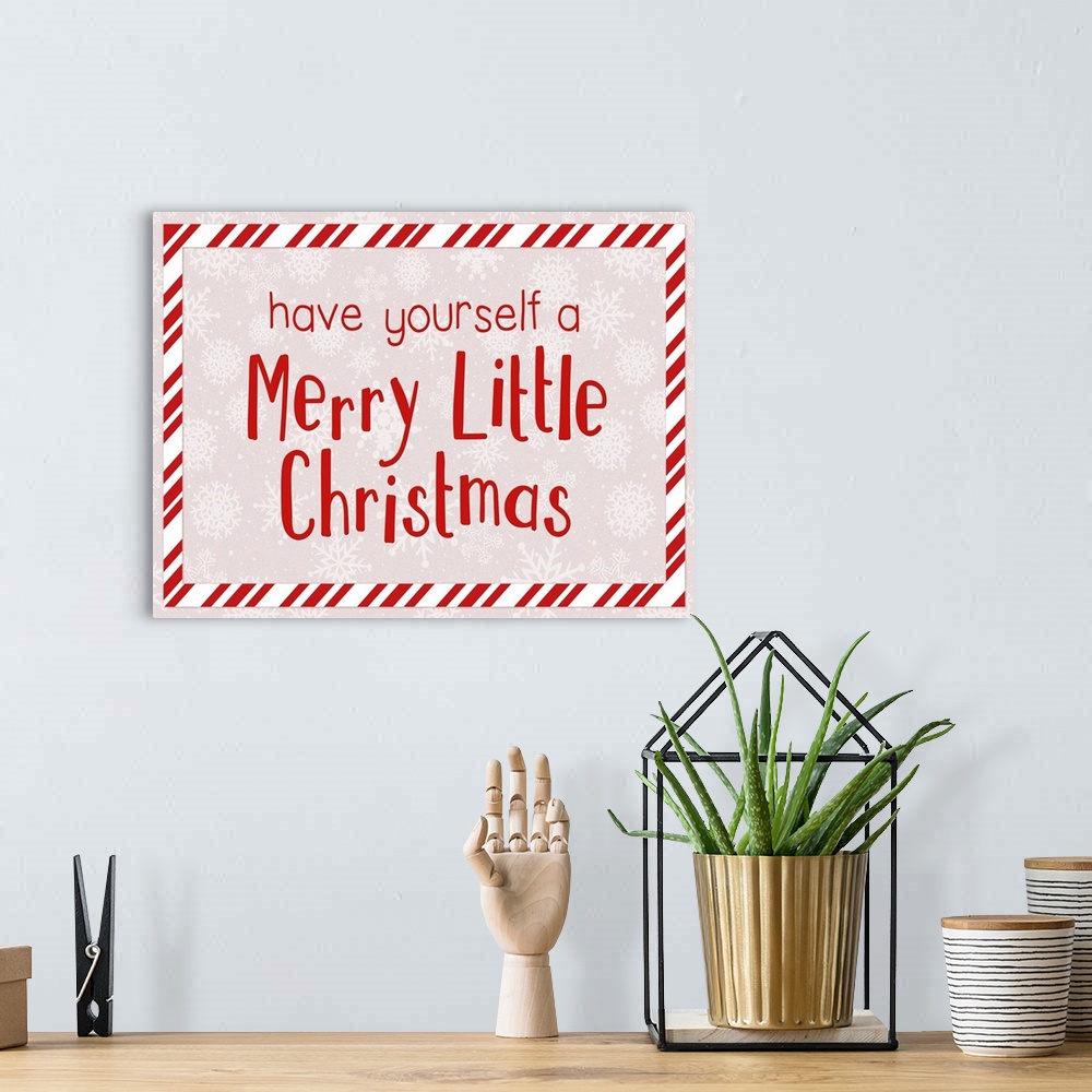 A bohemian room featuring Graphic holiday art with text surrounded by a striped rectangular border, on a light background w...