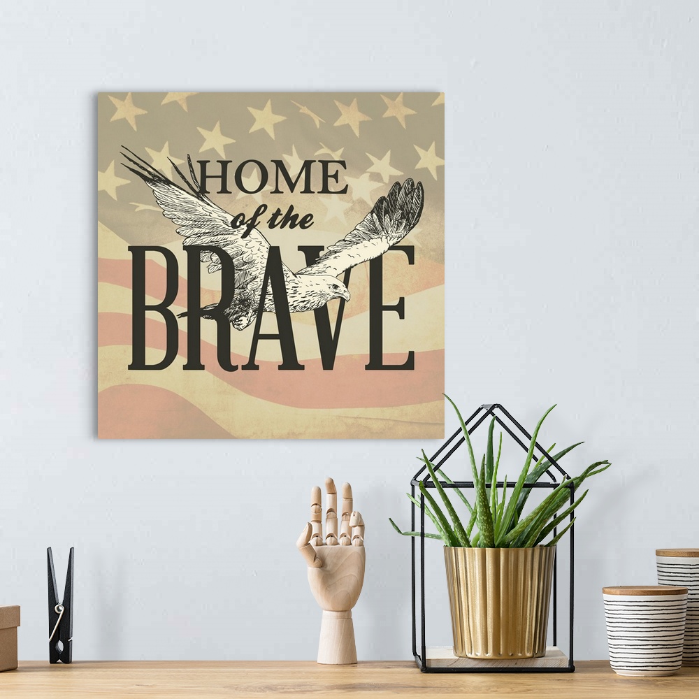 A bohemian room featuring "Home of the Brave" written in black with an illustration of an eagle flying though it, all on a ...