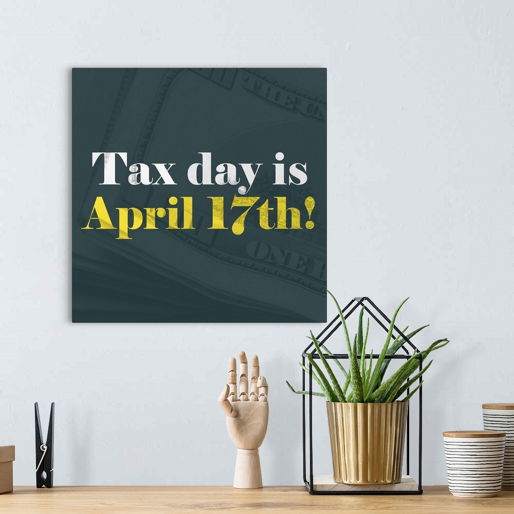 A bohemian room featuring "Tax Day Is April 17th!" written in white and yellow on top of a teal background with stacks of o...