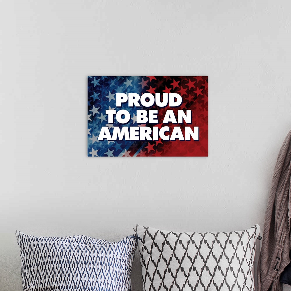A bohemian room featuring "Proud to be an American" written in white on a red, white, and blue background with stars.