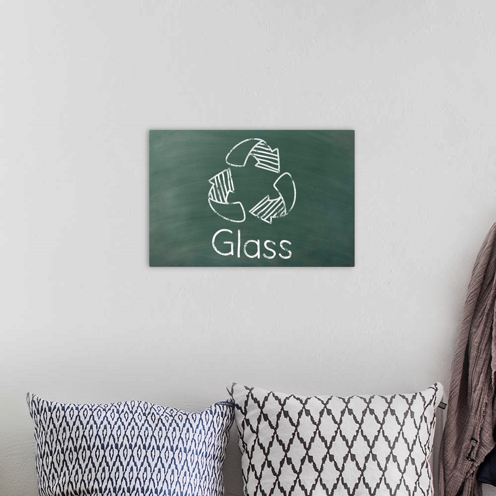 A bohemian room featuring Recycling symbol with "Glass" written underneath in white on a green chalkboard background.