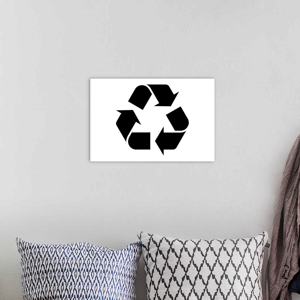 A bohemian room featuring Black recycling symbol on a white background
