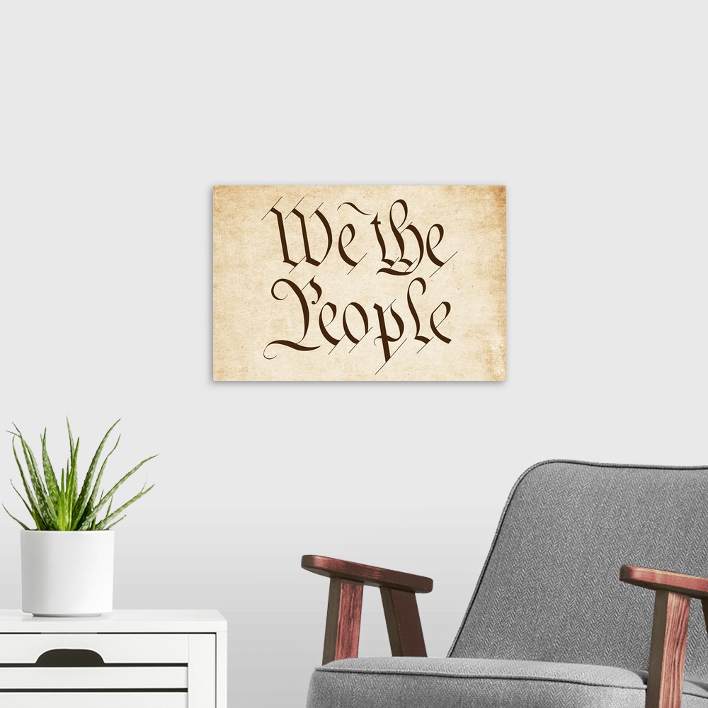 A modern room featuring "We the People" written in brown old timey script on a worn sepia background.