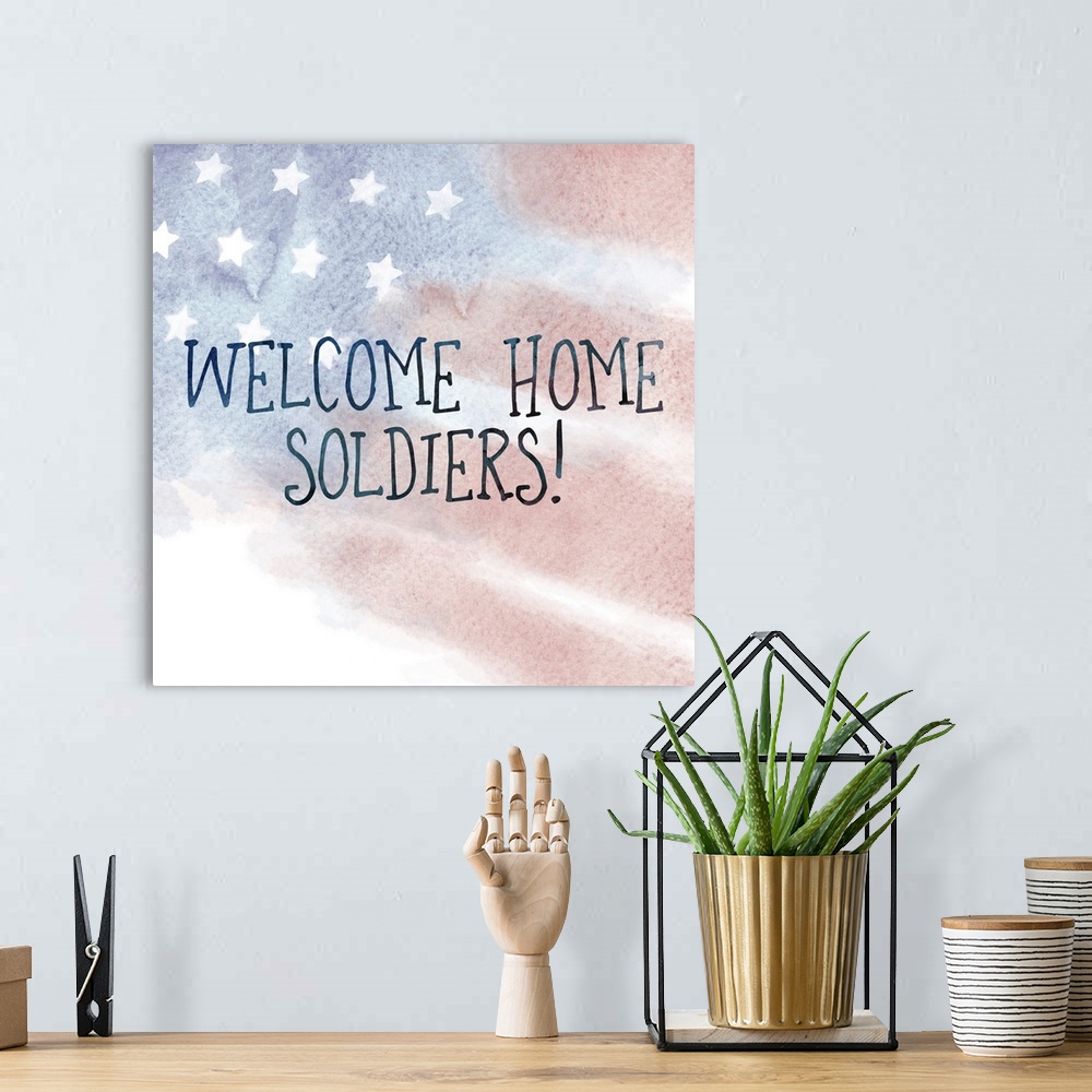 A bohemian room featuring "Welcome Home Soldiers!" written on top of a watercolor American flag.