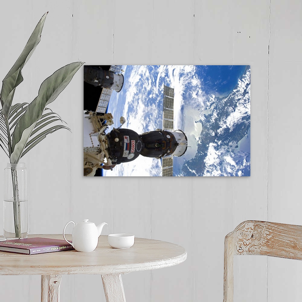 A farmhouse room featuring Photograph taken by Commander Chris Hadfield during expedition 34 to the International Space Stat...