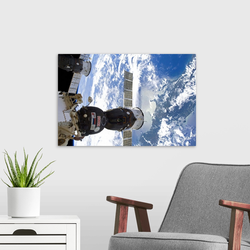 A modern room featuring Photograph taken by Commander Chris Hadfield during expedition 34 to the International Space Stat...