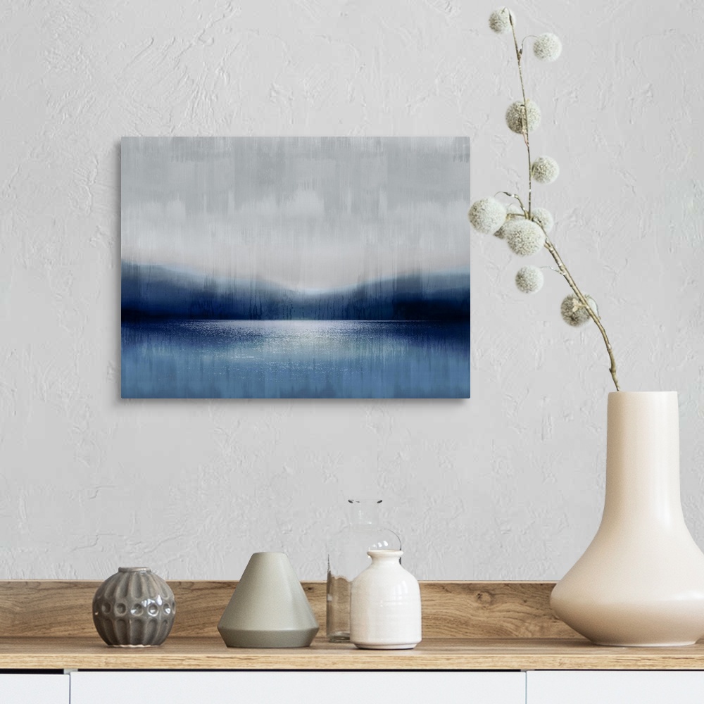 A farmhouse room featuring A misty, tranquil scene of a lake infront of mountains under a cloudy sky. The water and earth ar...