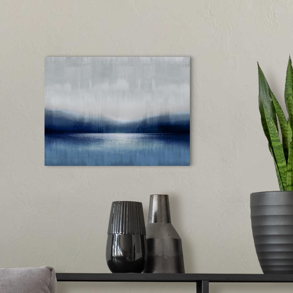 A modern room featuring A misty, tranquil scene of a lake infront of mountains under a cloudy sky. The water and earth ar...