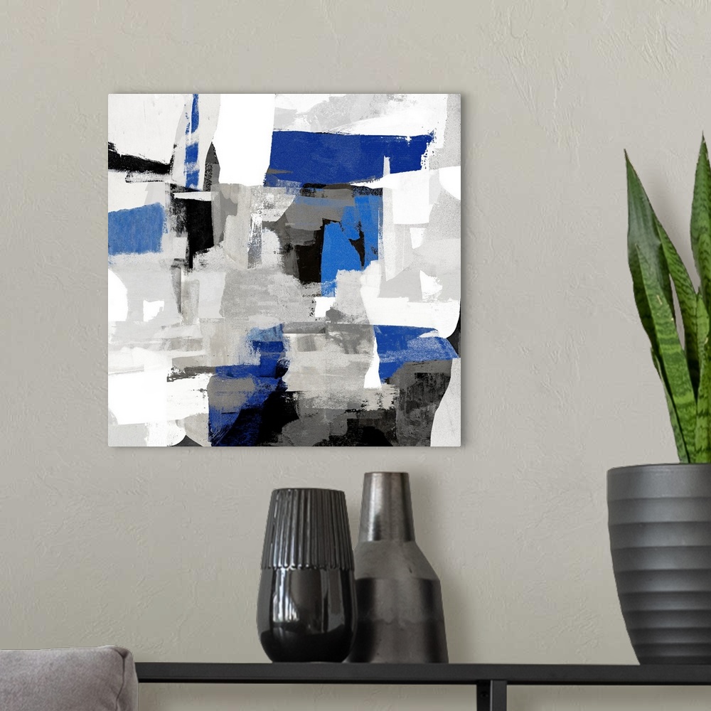 A modern room featuring Blue Brush Abstracts