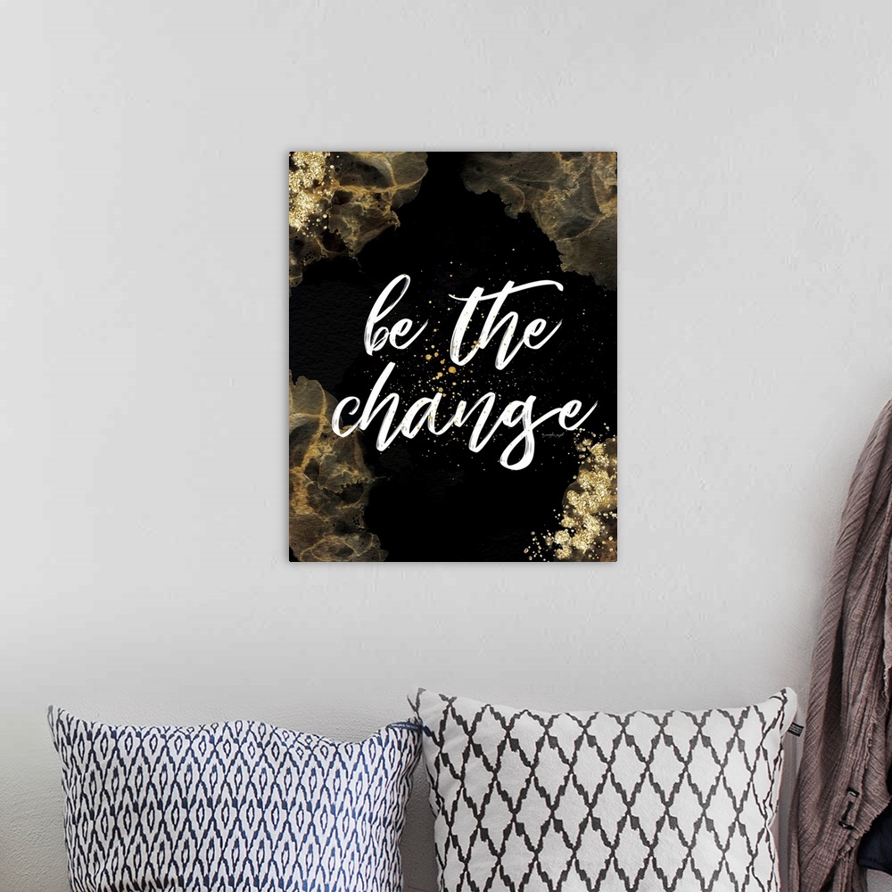 A bohemian room featuring Be the Change