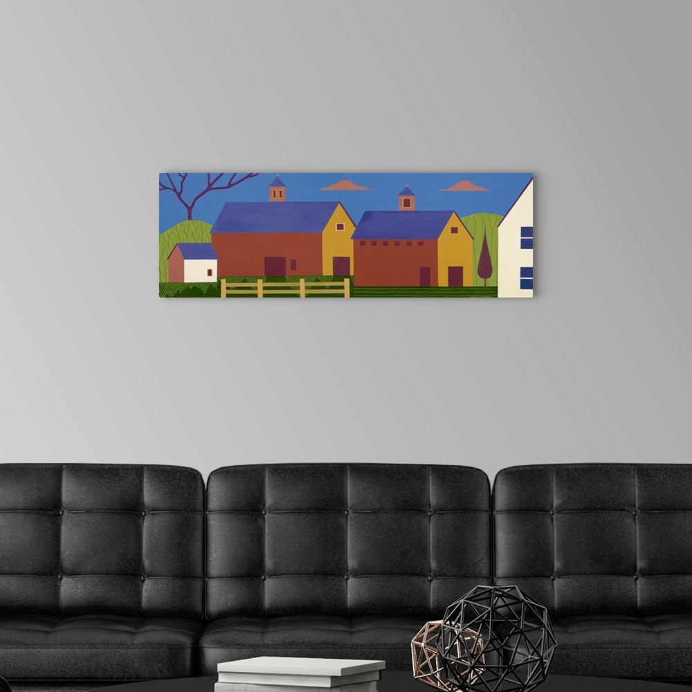 A modern room featuring Oversized, horizontal folk art on a wall hanging of simplistically shaped buildings in a group, s...