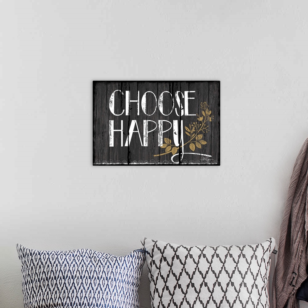 A bohemian room featuring Font-driven sign art conveys a wonderful sentiment about happiness, "Choose Happy"