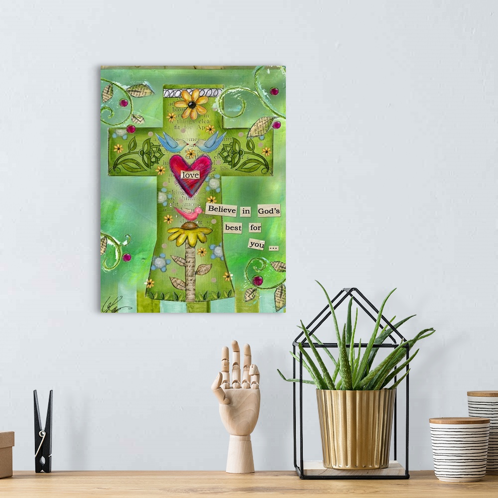 A bohemian room featuring A mixed media Christian artwork depicting a cross filled with elements of love such as flowers, h...