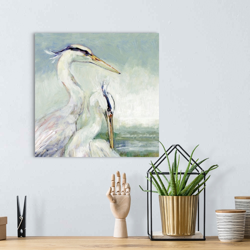 A bohemian room featuring A pair of egrets bring the graceful sea bird into any coastal decor.