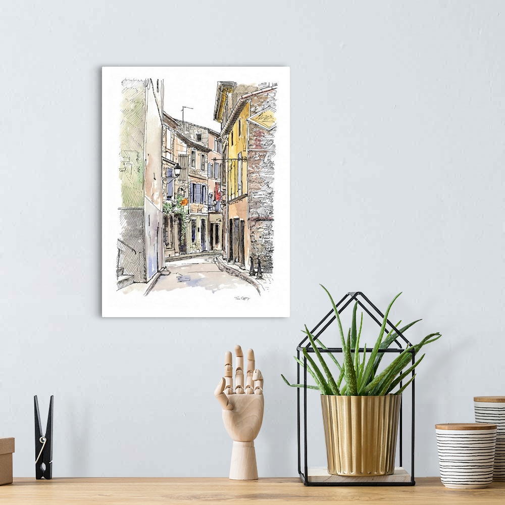 A bohemian room featuring A lovely pen and ink depiction of a European back alleyway.
