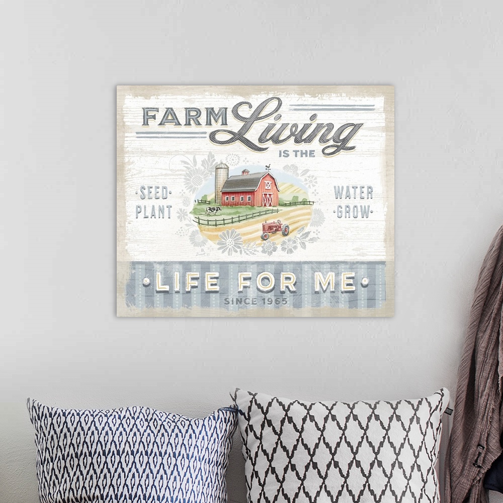 A bohemian room featuring Vintage farmhouse signage of a red barn evokes a sophisticated country style
