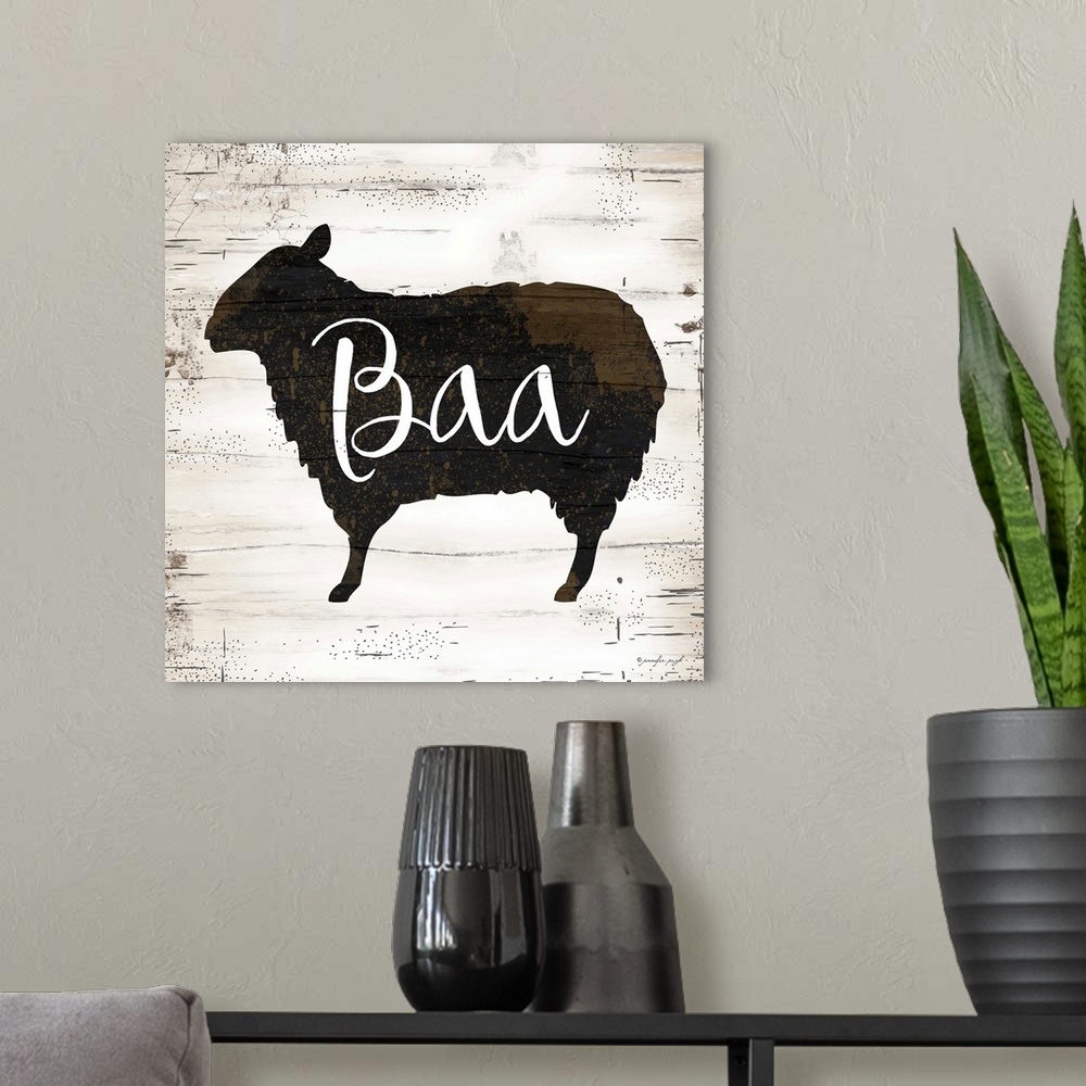 A modern room featuring Rustic art of the silhouette of a sheep with script text over it, on a background with an old woo...