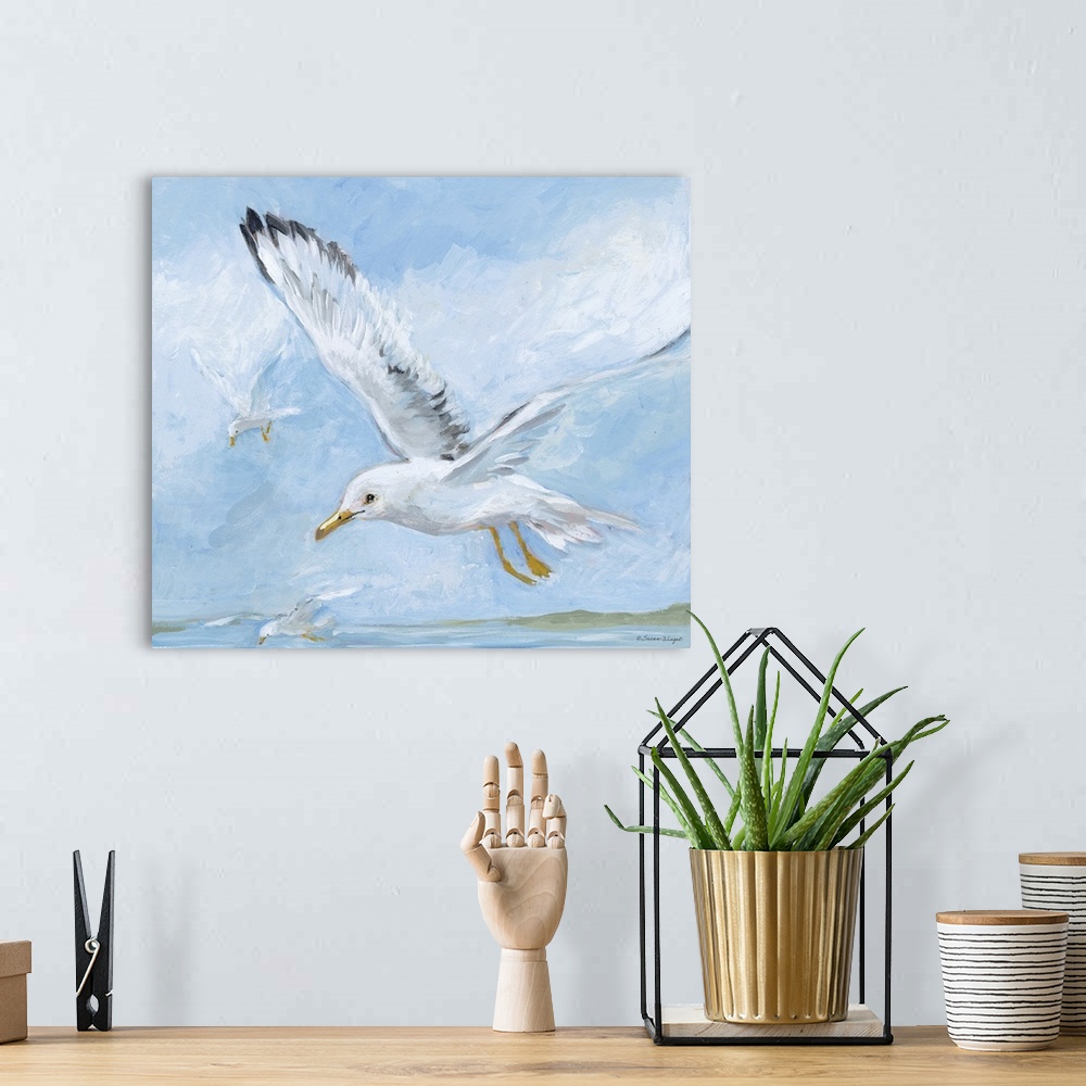 A bohemian room featuring Seagulls soar through the blue sky.