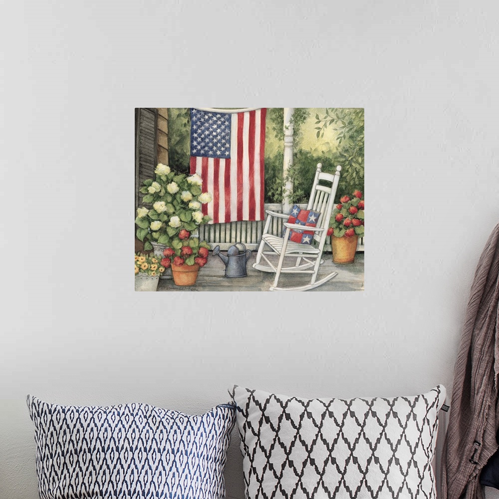 A bohemian room featuring Front porch setting with white rocking chair, flowers and big american flag.
