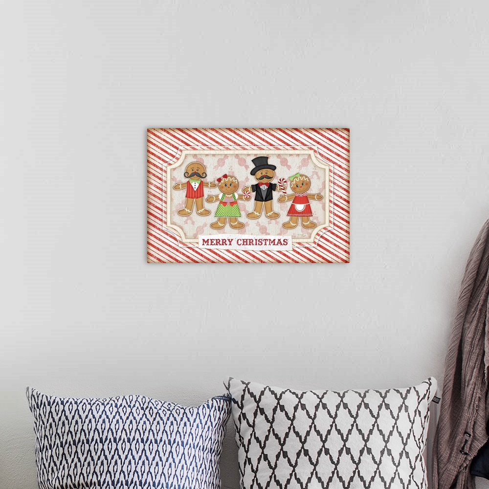 A bohemian room featuring Holiday themed home decor artwork of gingerbread people against a red and white striped background.