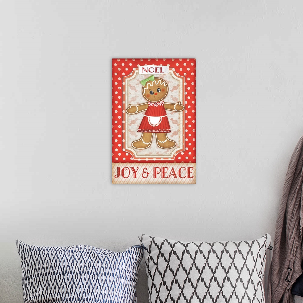 A bohemian room featuring Holiday themed home decor artwork of a gingerbread girl against a red and white polka dotted back...