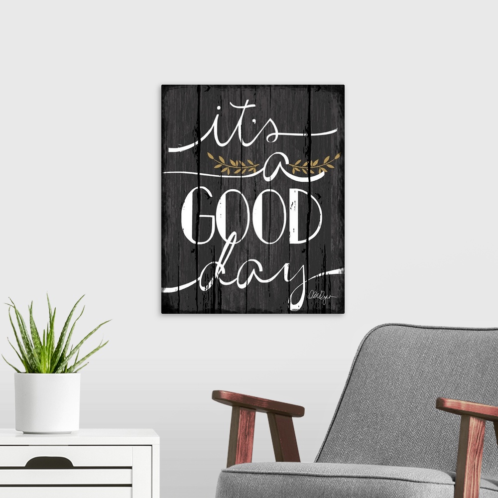 A modern room featuring Font-driven sign art conveys a wonderful sentiment about love and home, "It's a Good Day"