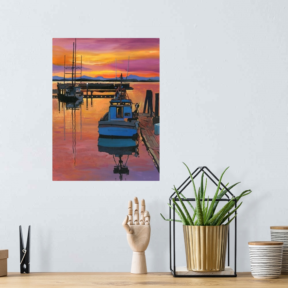 A bohemian room featuring A red sky faces the fearless boater in this beautiful boat scene.