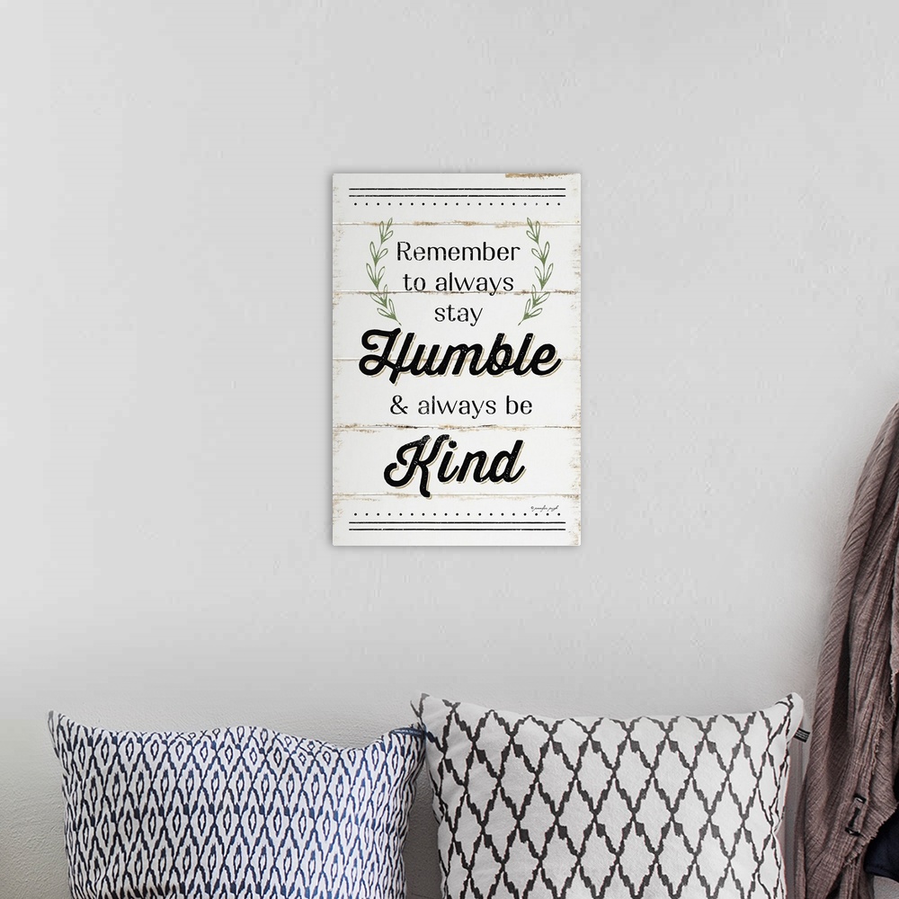 A bohemian room featuring "Remember to always stay Humble and always be Kind"on a white shiplap background.