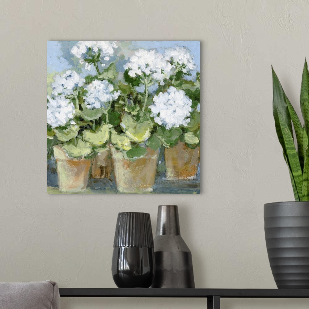 A modern room featuring This striking hydrangea pot vignette adds a dramatic statement to any room