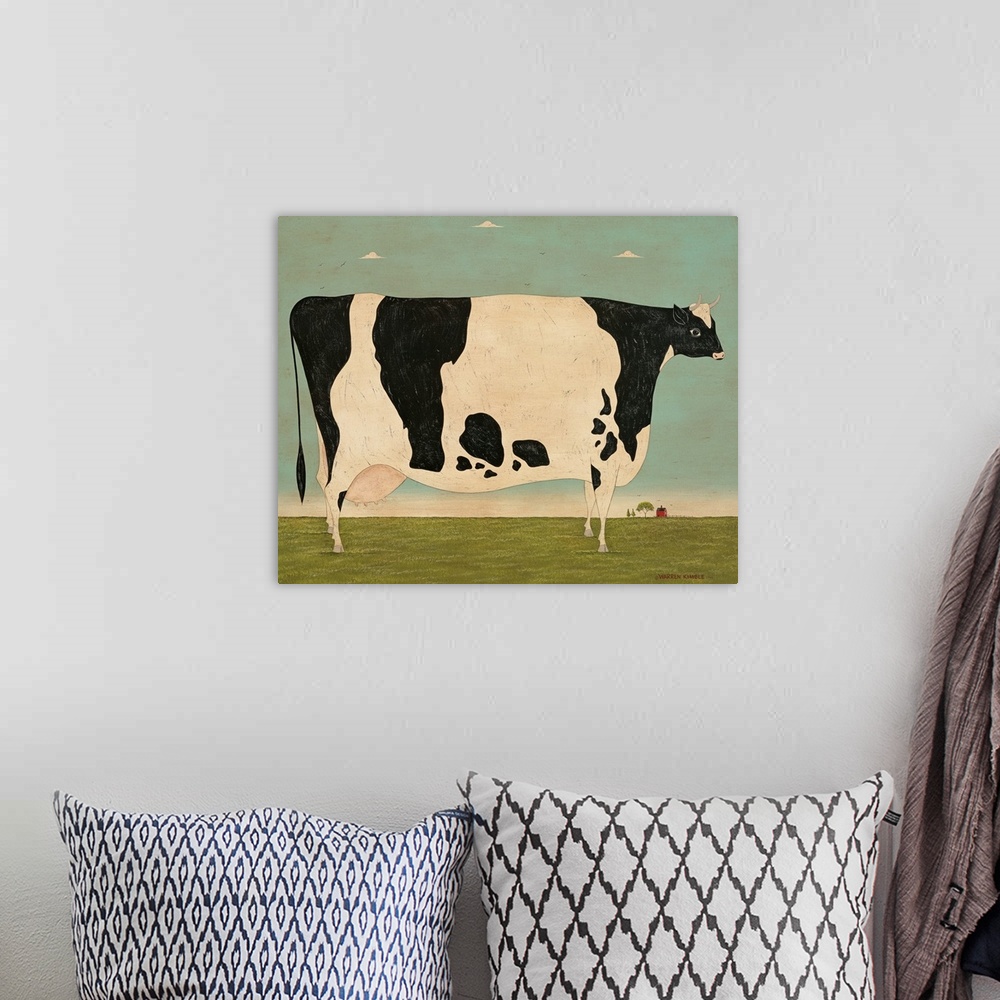 A bohemian room featuring Painting of a very large spotted cow in a green pasture on a Vermont farm.