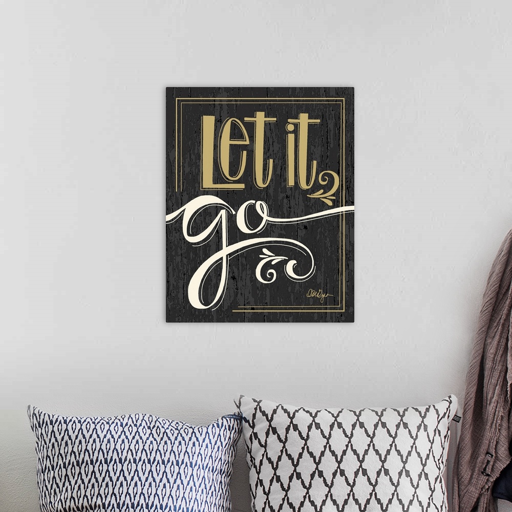 A bohemian room featuring Font-driven sign art conveys a sassy touch to any decor, "Let it Go"