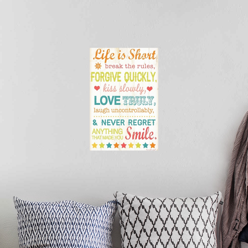 A bohemian room featuring Colorful typography against a cream background.