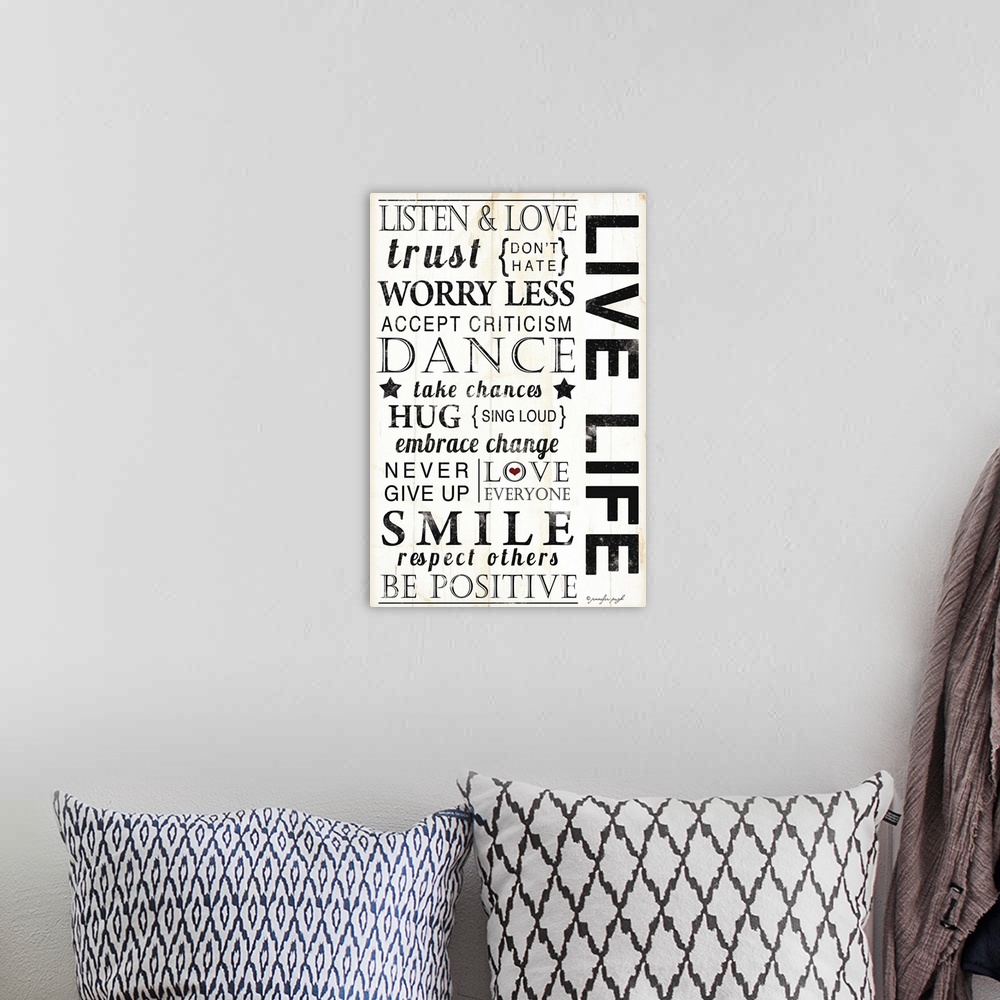 A bohemian room featuring Off white background with rustic black typography about family sentiments.