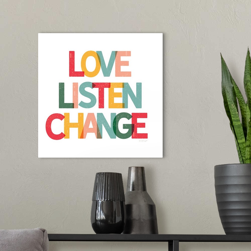 A modern room featuring Love, Listen, Change
