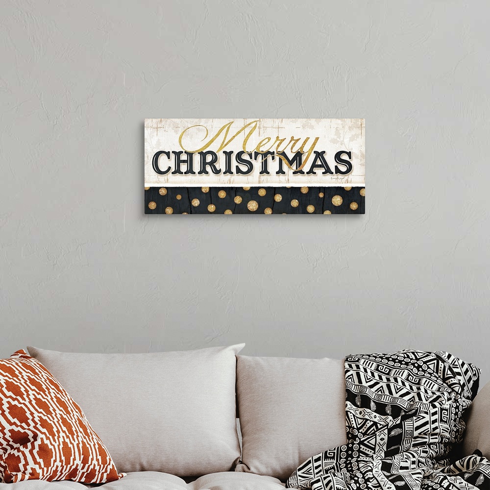 A bohemian room featuring Christmas themed contemporary typography artwork.