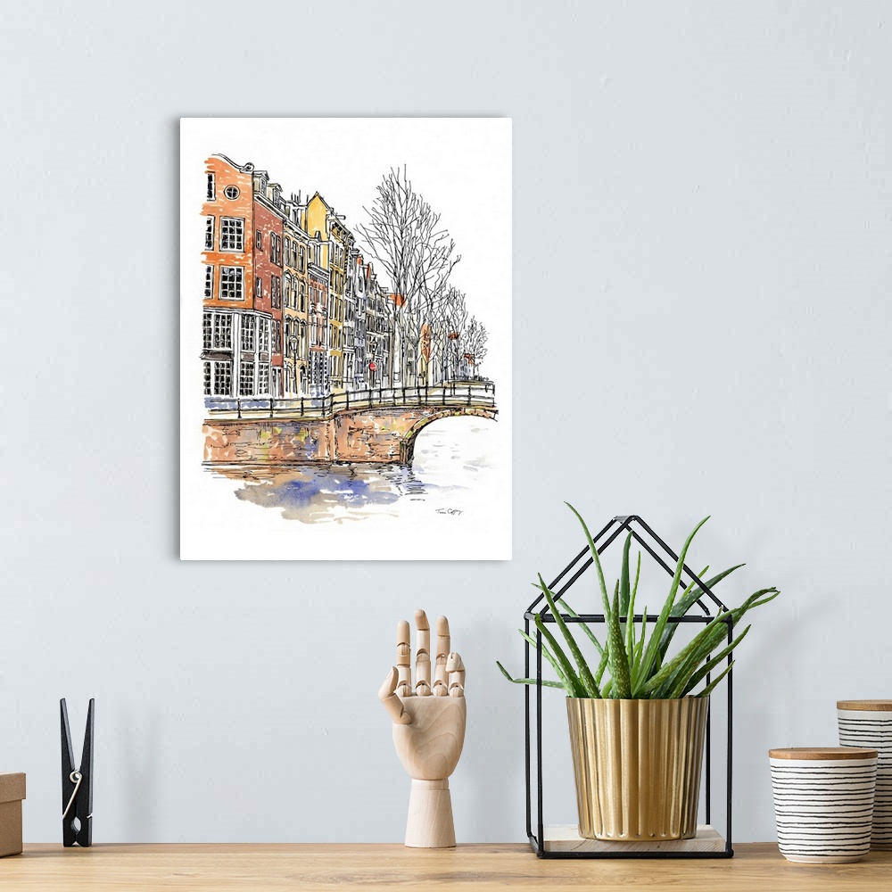 A bohemian room featuring A lovely pen and ink depiction of a northern European canals.