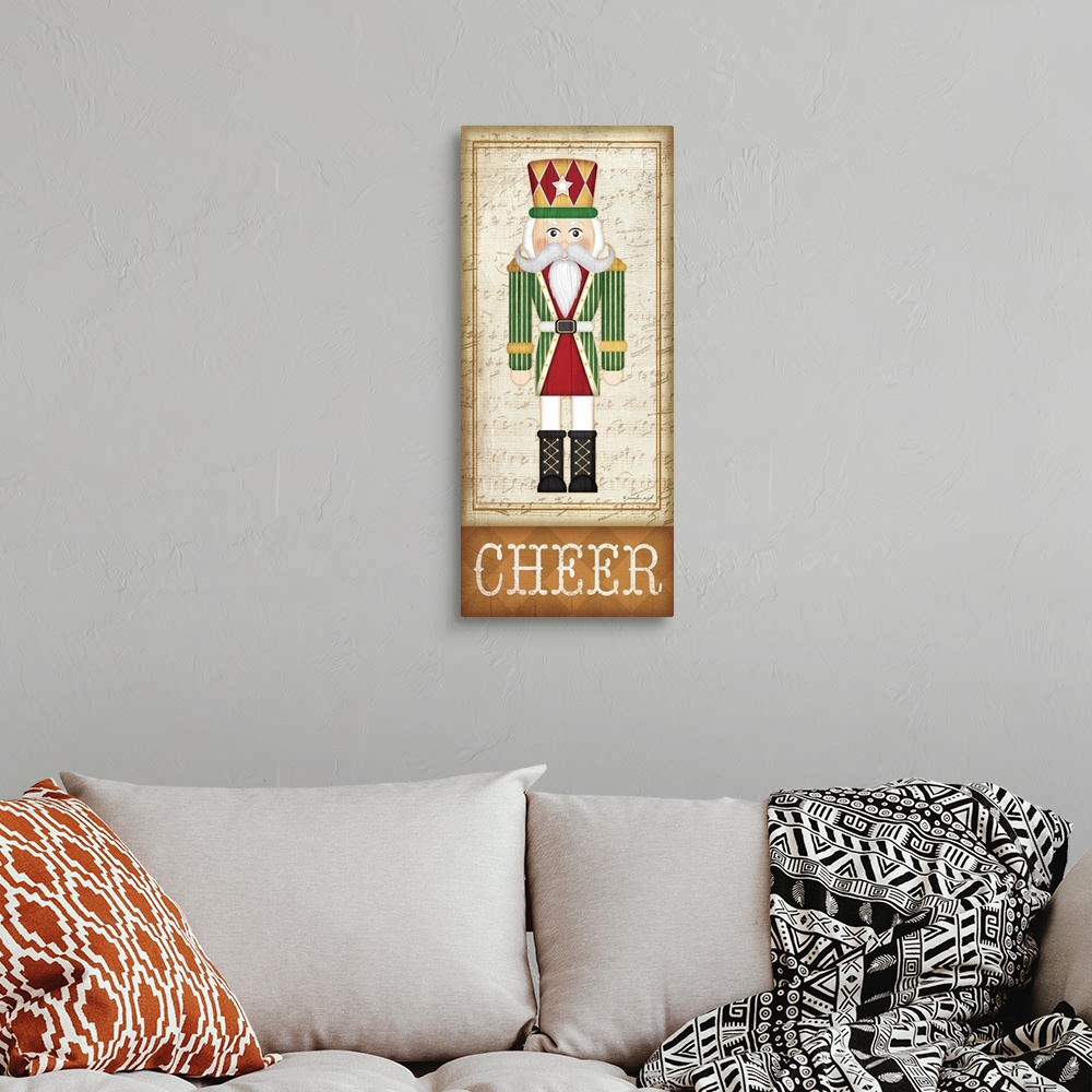 A bohemian room featuring Holiday themed home decor artwork of a nutcracker wearing a green striped tunic above the word Ch...