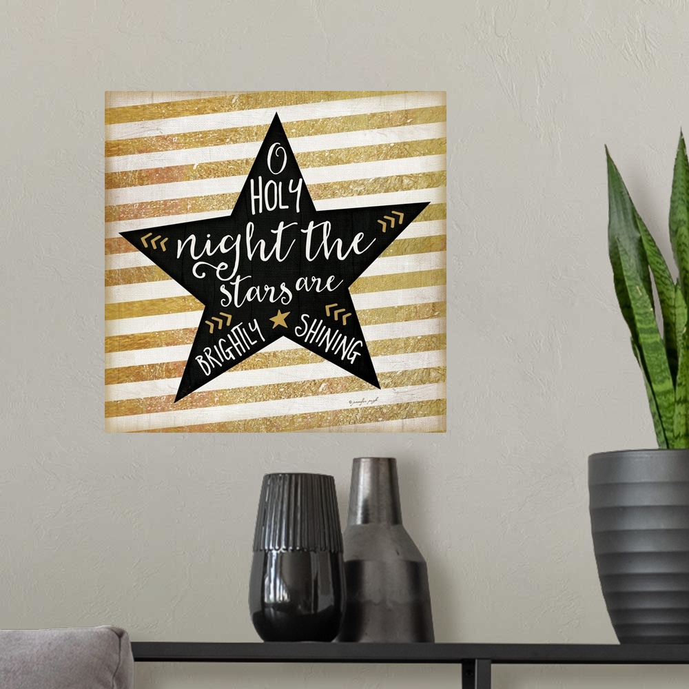 A modern room featuring Contemporary artwork of a black star with white handlettering against a background of gold and wh...