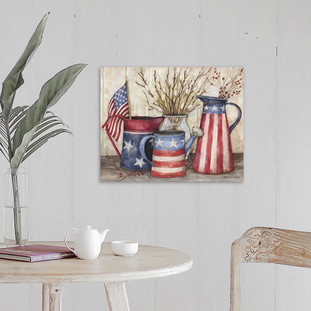 A farmhouse room featuring The garden goes Americana with these watering cans.