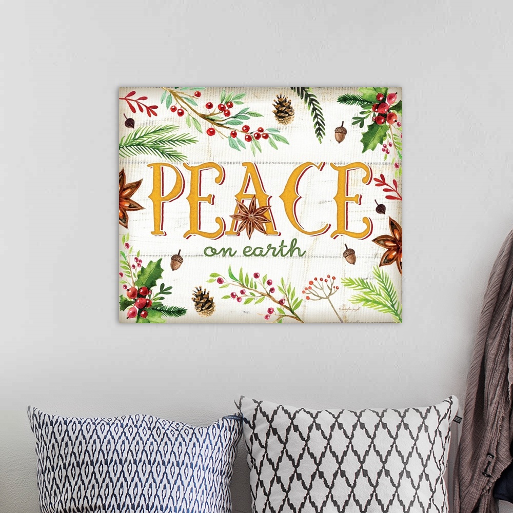 A bohemian room featuring Festive handlettered sign reading "Peace", decorated with holly, pine branches, acorns, and anise.