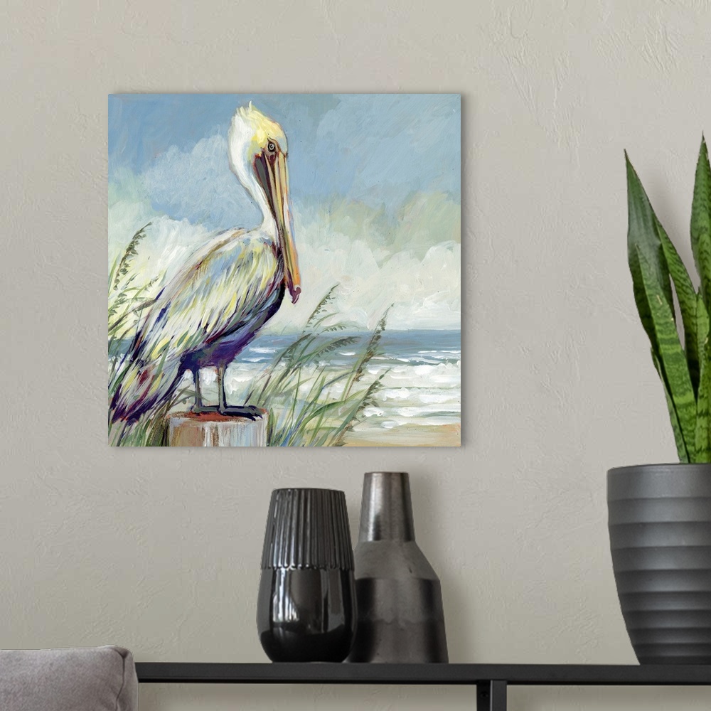 A modern room featuring A striking pelican sits and watches the tide.