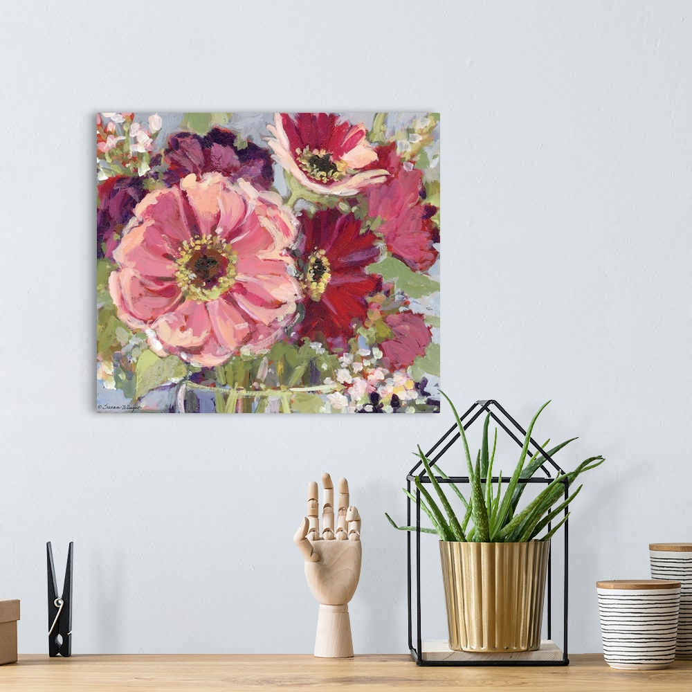 A bohemian room featuring This striking floral bouquet adds a dramatic statement to any room