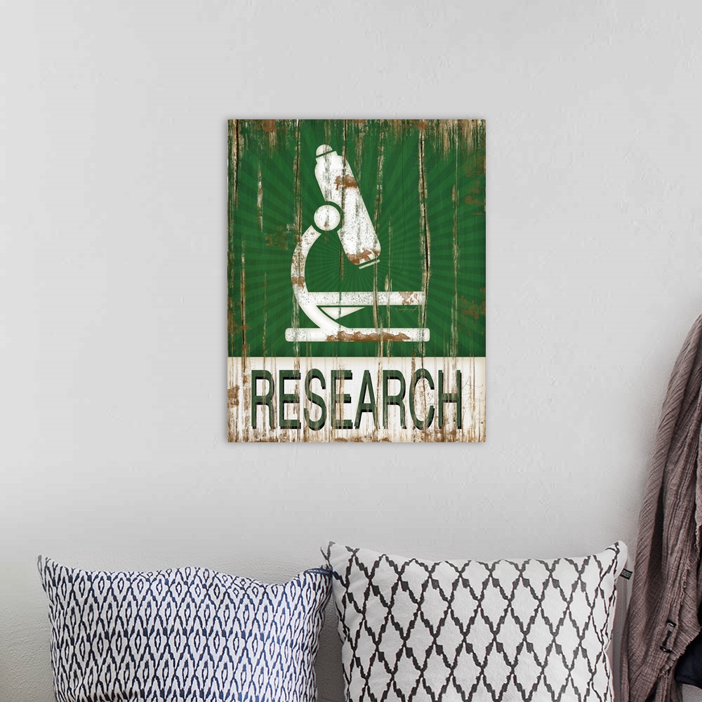 A bohemian room featuring This distressed decor features a microscope with the word, "Research" underneath.